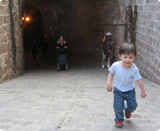 E hiking up the entrance ramp at Montjuic Castle in Barcelona