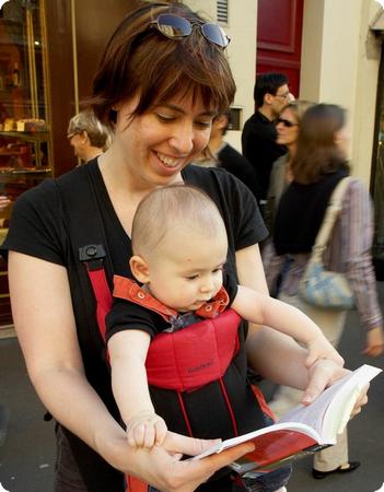 Everest (6 months old) reading the Paris guidebook