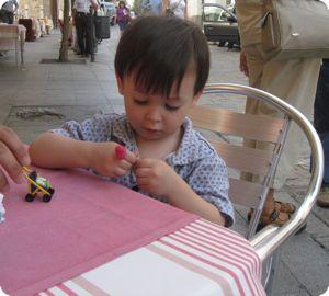 E playing quietly at mealtime