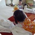 D & E investigate the child sized robes and slippers at the Four Seasons Aviara