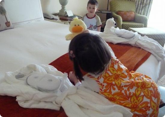 D & E investigate the child sized robes and slippers at the Four Seasons Aviara