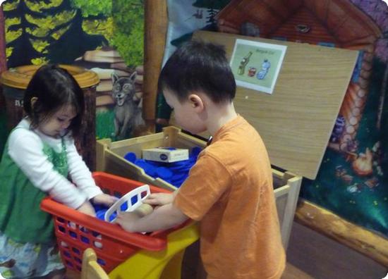 Filling the Shopping Cart with Recyclables at Great Wolf's Cub Club