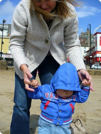 Baby Learning to Walk on the Beach