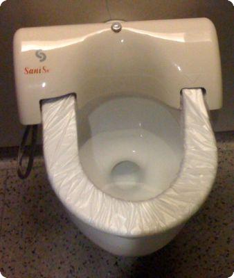 Self-covering toilet in Chicago O'Hare Airport
