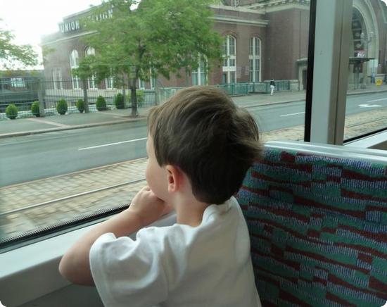 E enjoying a ride on the Tacoma Light Rail