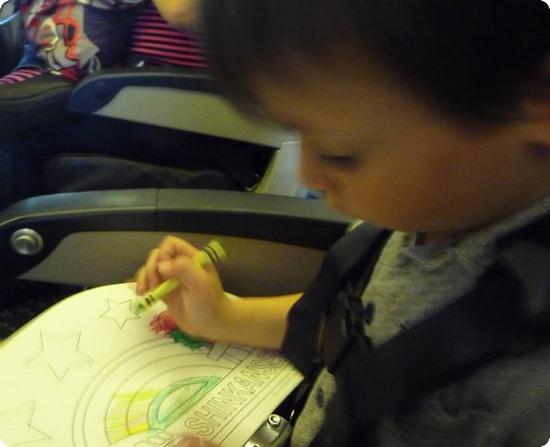 E is entranced by his train coloring book