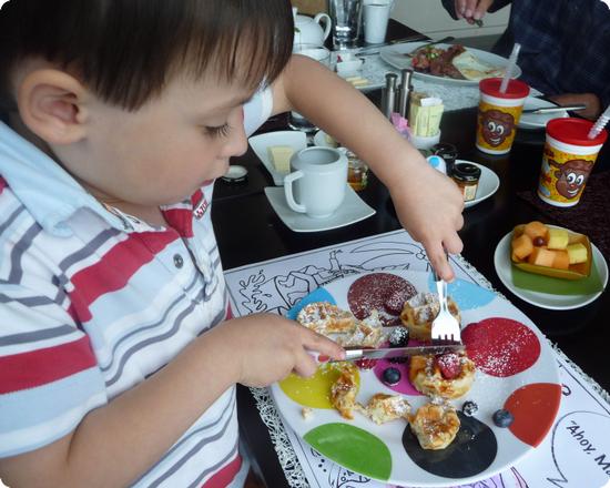 E digs into his breakfast at the Four Seasons Seattle