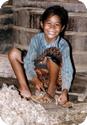 Child Worker in a Fish Paste Factory in Batambang Cambodia