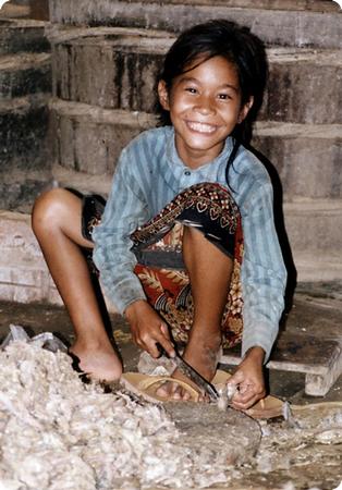 Child Worker in a Fish Paste Factory in Batambang Cambodia