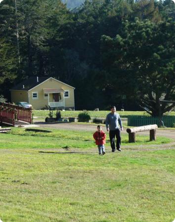 E explores the Mar Vista grounds with his daddy