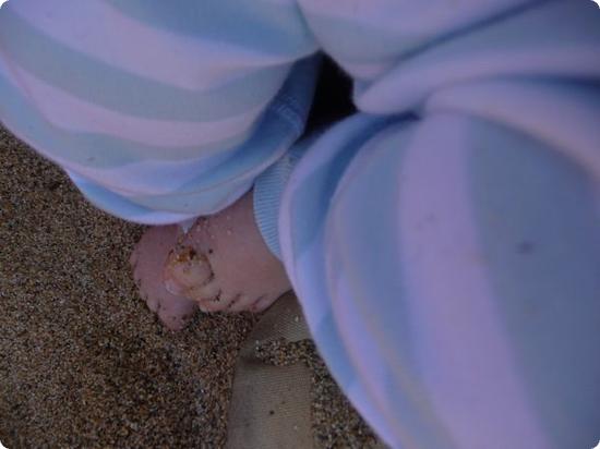 Eilan's little baby feet in the sand for the first time ever