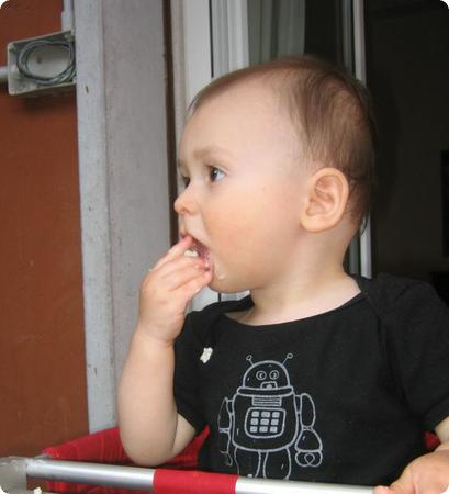 E eating breakfast on our small balcony in Rome.