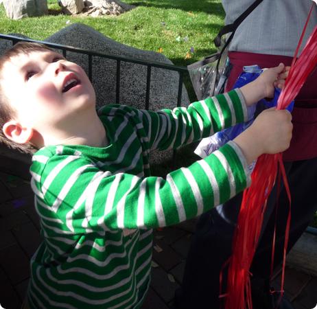 E holds the balloons - hope he doesn't float away!