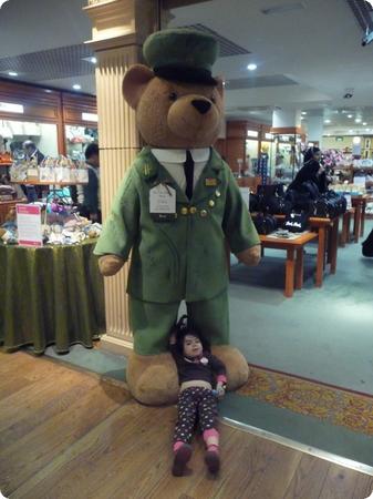 D sacked out with the Harrods bear at Heathrow Airport