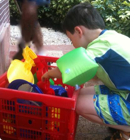 Everest chooses a bucket and shovel to take to the beach