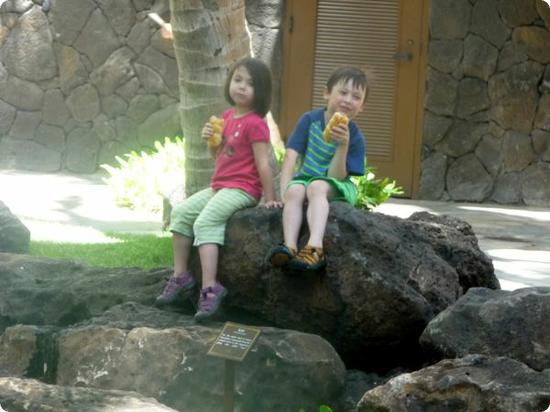 Everest and Darya enjoy a snack at the Royal Grove in the Royal Hawaiian Center in Honolulu