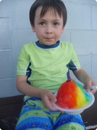 Everest wonders how he's going to finish a shave ice bowl that is as big as his head
