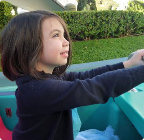 Darya settles into a boat at small world