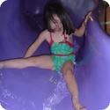 Darya enjoys a waterslide at Great Wolf Lodge in Grand Mound, WA