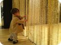 Eilan explores the entrance to an exhibit at SFMOMA