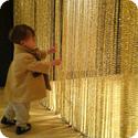 Eilan explores the entrance to an exhibit at SFMOMA