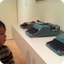 Everest "admires" the typewriters at SFMOMA