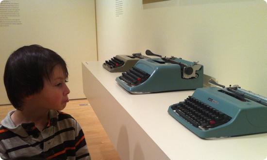 Everest "admires" the typewriters at SFMOMA