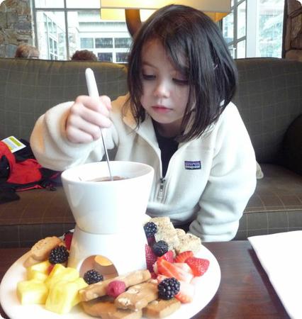 Darya digs into the Fondue at the Fairmont Chateau Resort in Whistler, BC