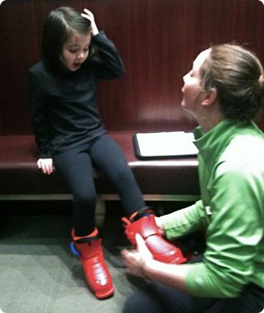 Darya gets fitted for ski boots at the Four Seasons Resort in Whistler, Canada