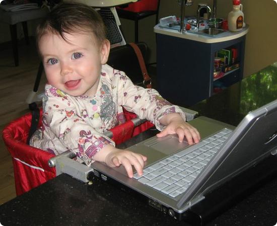 Darya (age 18 months) on the computer