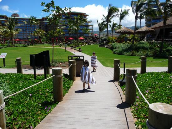 Everest and Darya head to the beach at Honua Kai Resort on Maui