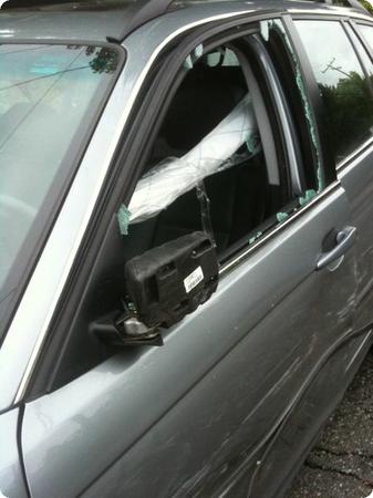Ouch. shattered window, side airbag, broken steering column and more...