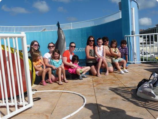 Darya is not liking being splashed by a Dolphin at the Clearwater Beach Aquarium