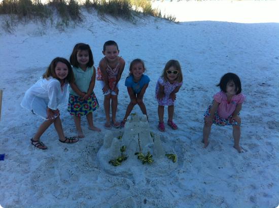 A shady spot on the beach and a sandcastle.  What a great combination.