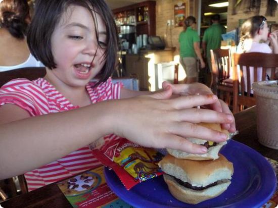 Darya digs into mini-hamburgers at the Tate Grill