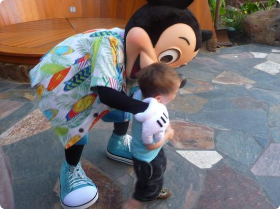 Eilan and Mickey Mouse have a private conversation