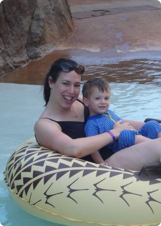 Eilan and I cuddle up in a "bagel" for a soothing ride down Aulani's Lazy River