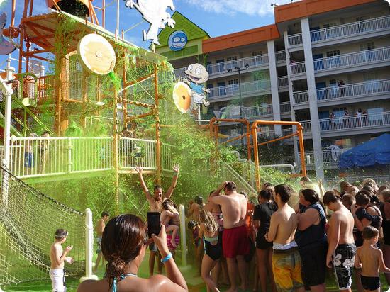 Mass sliming by the pool at Nickelodeon Suites Resort