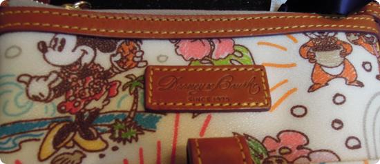 Closeup of Dooney and Bourke Logo on front of bag