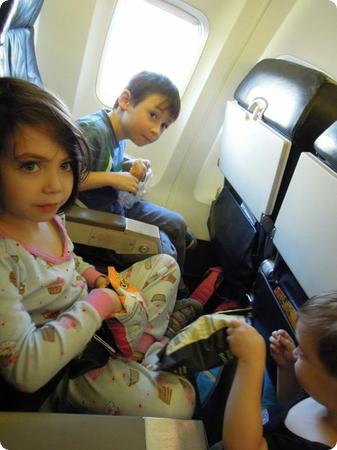 Believe it or not, traveling solo with three kids can be manageable (if chaotic)