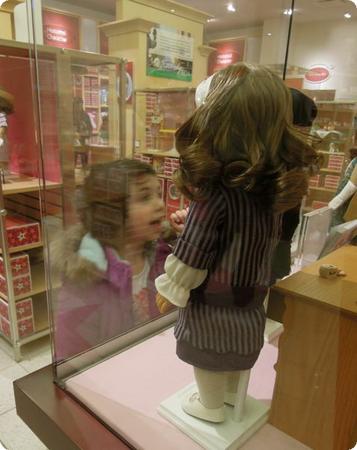 Darya admires her doll's period outfits at the American Girl Doll Store in Lynnwood, WA