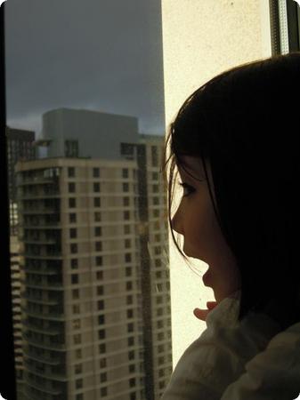 Darya admires the view at the Grand Hyatt Hotel in Seattle