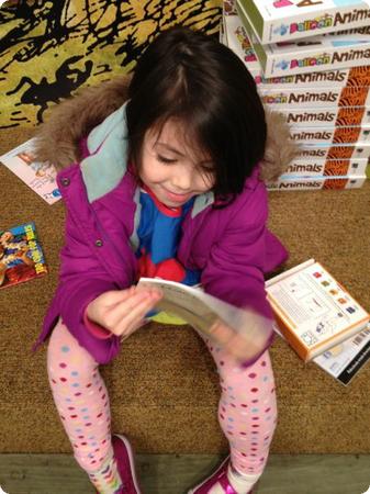 Darya checks out a book at Barnes and Noble's Children's Section in Downtown Seattle