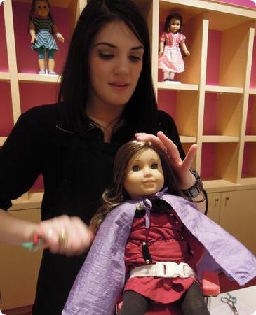 Rebecca gets her hair brushed and re-curled at the American Girl Doll store