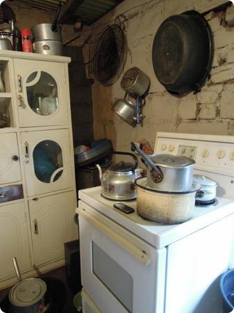Electric stove inside a 2mx3m kitchen/living/work space