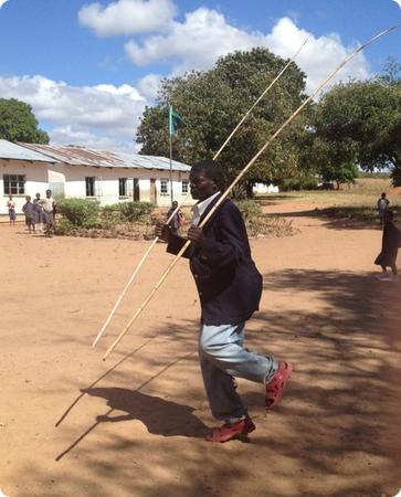 Community member dancing a Chitonga welcome dance