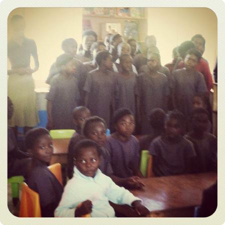 Kids at the Chilileka Basic School in Rural Zambia welcome us to their new library