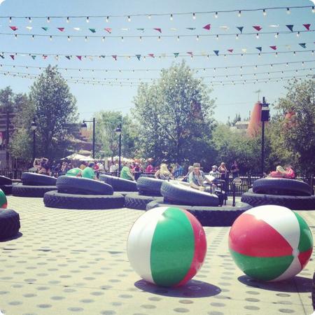 Luigi's Flying Tires Ride has a Carnival Like Atmosphere