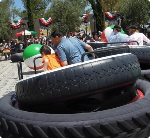 Everest and Peyman lean into the action at Cars Land