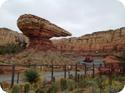 Cars race to the finish line at the Radiator Springs Racers ride in California Adventure